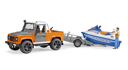 Bruder 02599 - Land Rover Defender con Remolque, Scooter de mar y Personaje