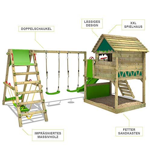 FATMOOSE Parque infantil de madera TikaTaka con columpio SurfSwing y tobogán manzana verde, Casa sobre pilares de exterior con arenero y escalera para niños