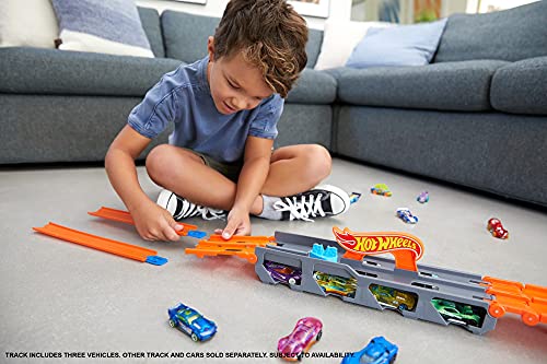 Hot Wheels City Camión autopista, pista de coches de juguete de 2 metros con lanzador, incluye 3 vehículos (Mattel HGH33)