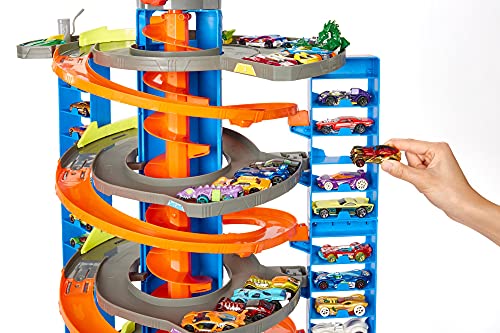 Hot Wheels City Mega garaje, pista de coches de juguete con almacenamiento de vehículos (Mattel HFH03)