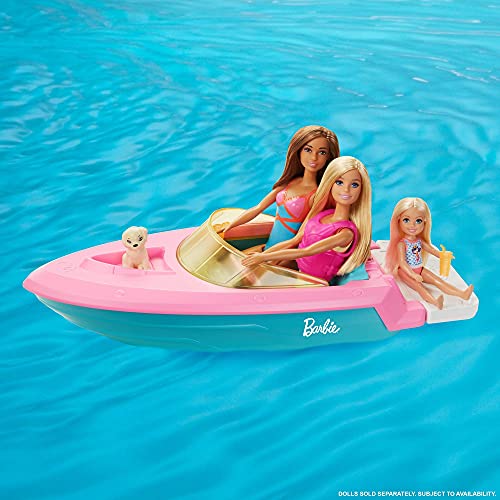 Barbie con Barco, Muñeca con bañador y barco de juguete para el agua, con mascota y accesorios acuáticos (Mattel GRG30)