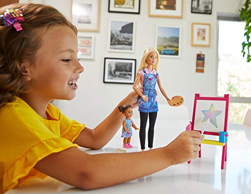 Barbie Quiero Ser maestra de arte, muñeca rubia con bebé y accesorios (Mattel GJM29)