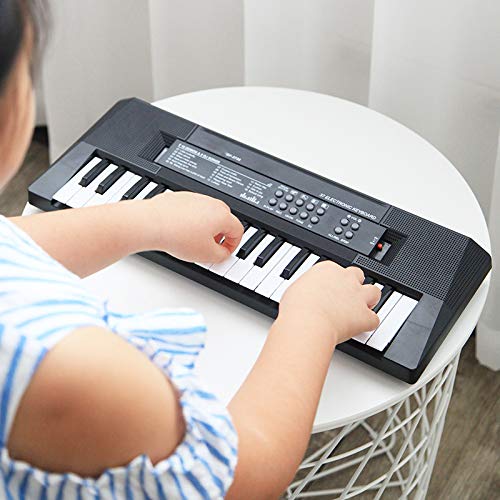 BestSiller Teclado de piano portátil de 54 llaves, mini teclado de música eléctrico para niños, juguete educativo para niños con fuente de alimentación dual y mini micrófono para principiantes