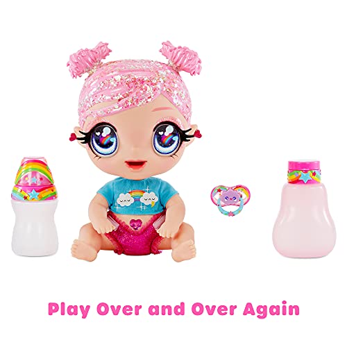 Glitter Babyz Muñeca Dreamia Stardust - Con 3 cambios de color mágicos, pelo rosa y vestido arcoíris - Incluye pañal, biberón y chupete reutilizables - Para coleccionar - Edad: 3+ años