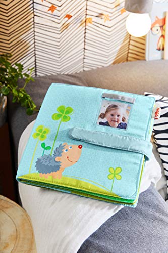 HABA 305258 - Álbum de fotos para bebé (10 páginas, bolsillos para 8 fotos de 10 x 15 cm, a partir de 12 meses)