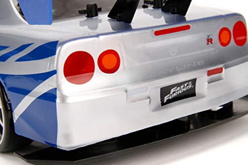 Jada Toys Fast & Furious RC Nissan Skyline GTR R34 - Coche teledirigido con Mando a Distancia, tracción a Las 4 Ruedas, función de Carga USB, Escala 1:10, Color Azul y Plateado