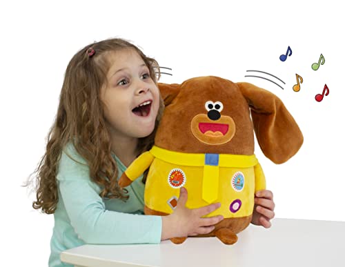 Hey Duggee de Bizak, Peluche Bailarín Duggee, Peluche para Bebé, Juguete de Peluche Musical que Mueve las Orejas con Diferentes Sonidos y Canciones, Peluche de 25 cm